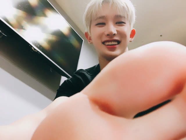 (taking a selfie with his toes)