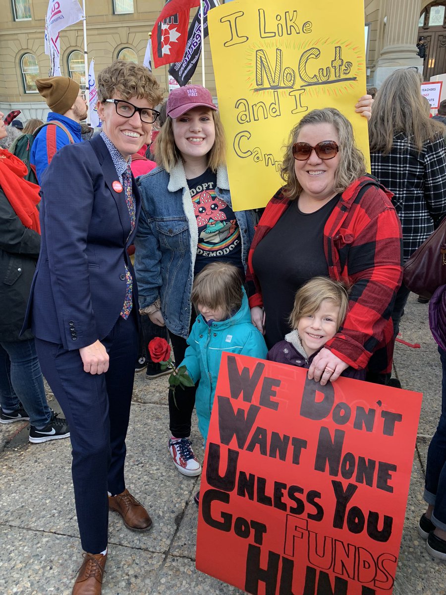 I’m standing with this family and thousands right now at the Alberta Legislature saying NO to Jason Kenney’s cuts. Albertans are getting louder and louder and will not be silent in the face of austerity. #marchforwhatmattersyeg #abed #ableg
