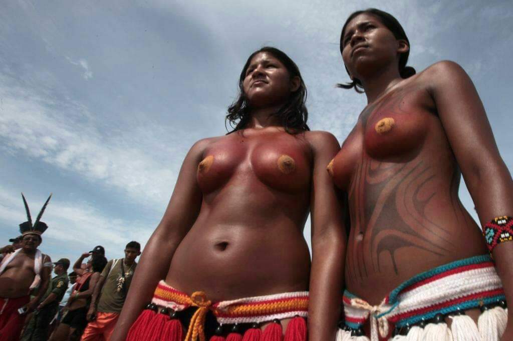 Reporter goes topless in african tribe