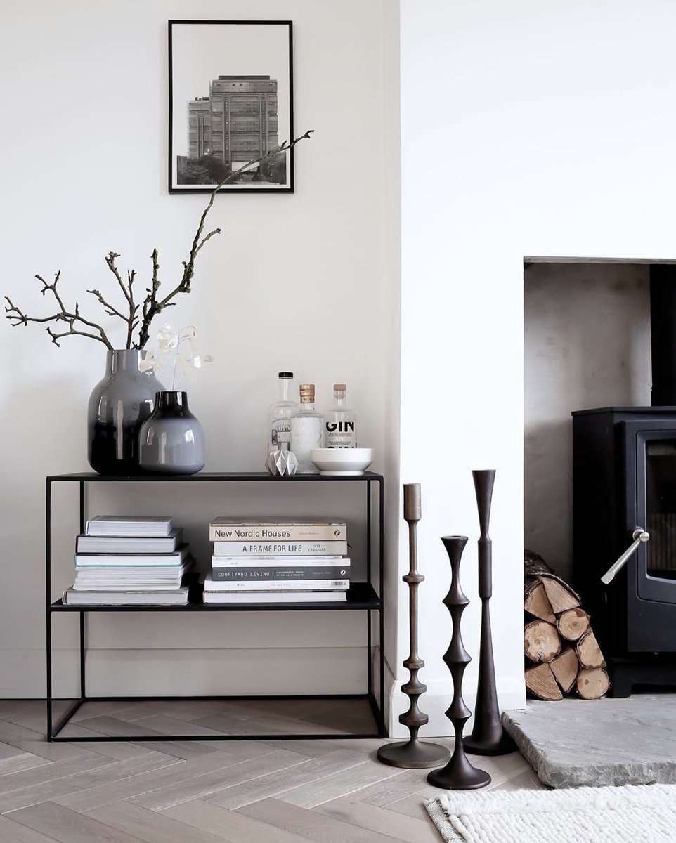 VenoorLiving's tweet photo. From the warmth of candle light to the touches of rustic charm, our Sirsa candlesticks embrace @designhunteruk's minimalist living room with distinctive flair. > https://t.co/QnlPSHVYdi https://t.co/j3QV1WgZD7