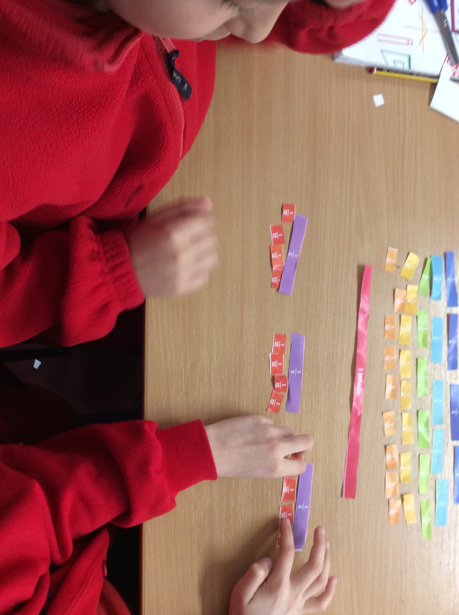 MaundeneSchool's tweet photo. This week Ravens have started learning about fractions. This morning we have been exploring equivalent fractions using concrete materials. We discussed our findings as a class. #maths #fractions #exploringmaths https://t.co/UjN4gKtmBJ