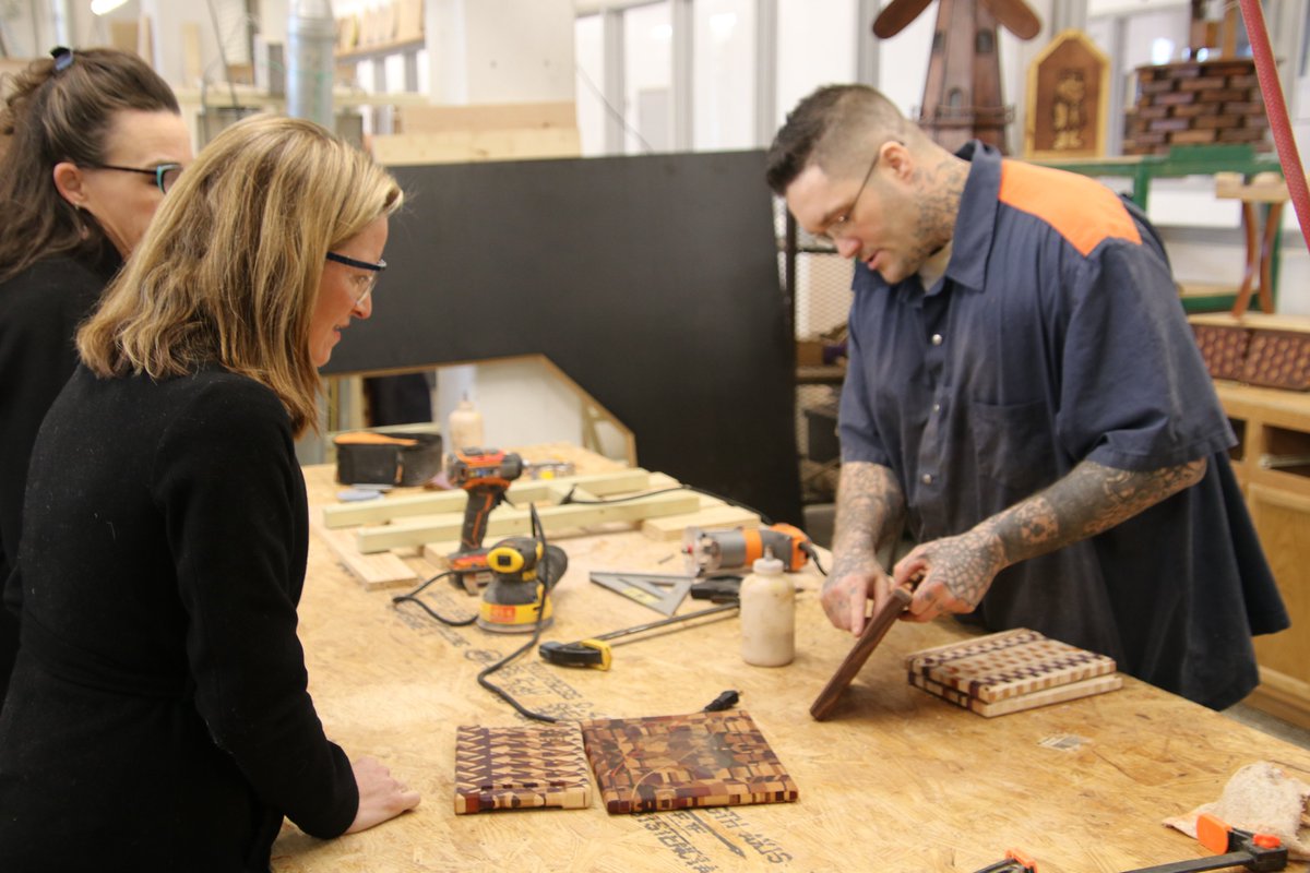 Secretary Benson tours Vocational Village.