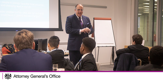 attorneygeneral's tweet photo. The Solicitor General visited Allen & Overy yesterday, and observed a #BigLegalLesson as part of Justice Week. He also gave a speech on the importance of young people learning about the law, and the ways it can empower them. #JusticeWeek https://t.co/yepQ8Fultw