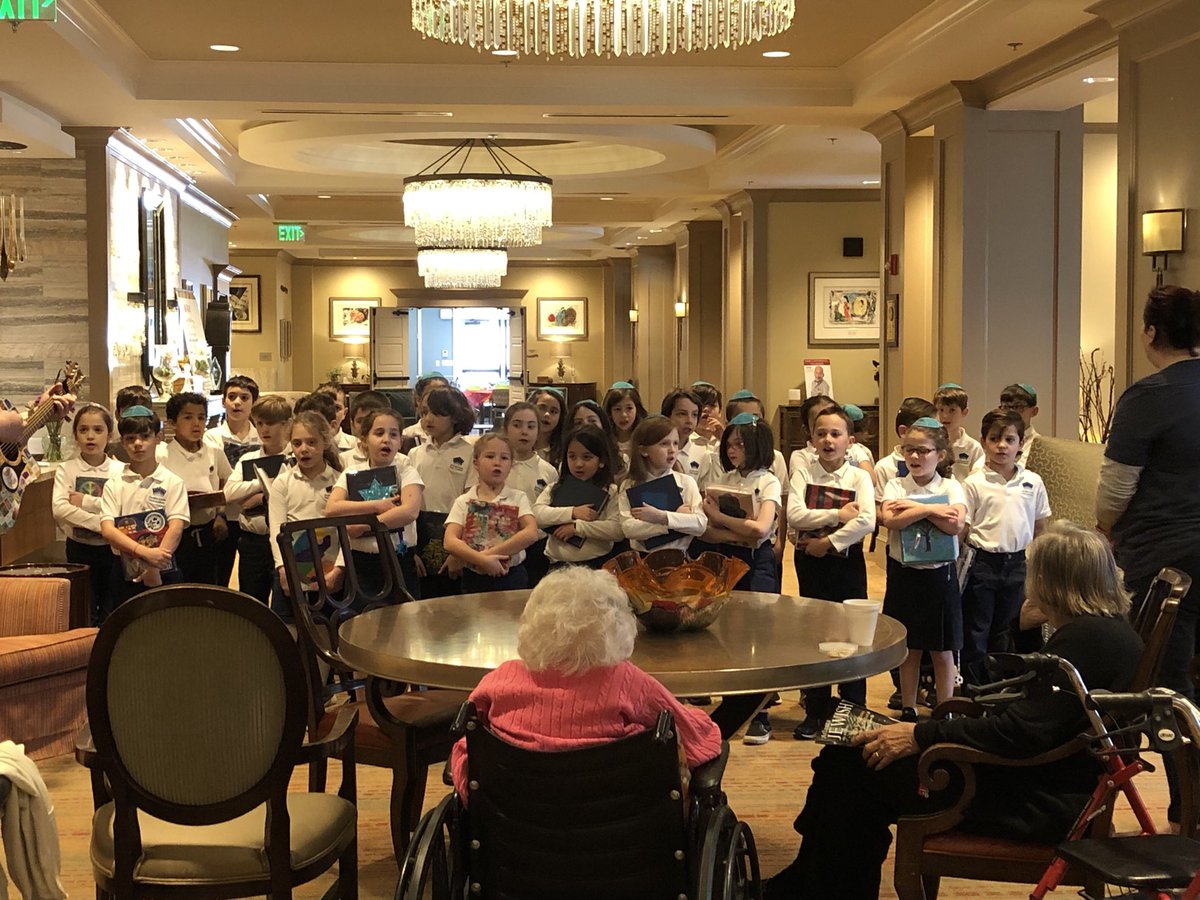 Singing and Showing off our siddurs to the residents at Berman Commons. #davis2 #proudschool #bermancommons