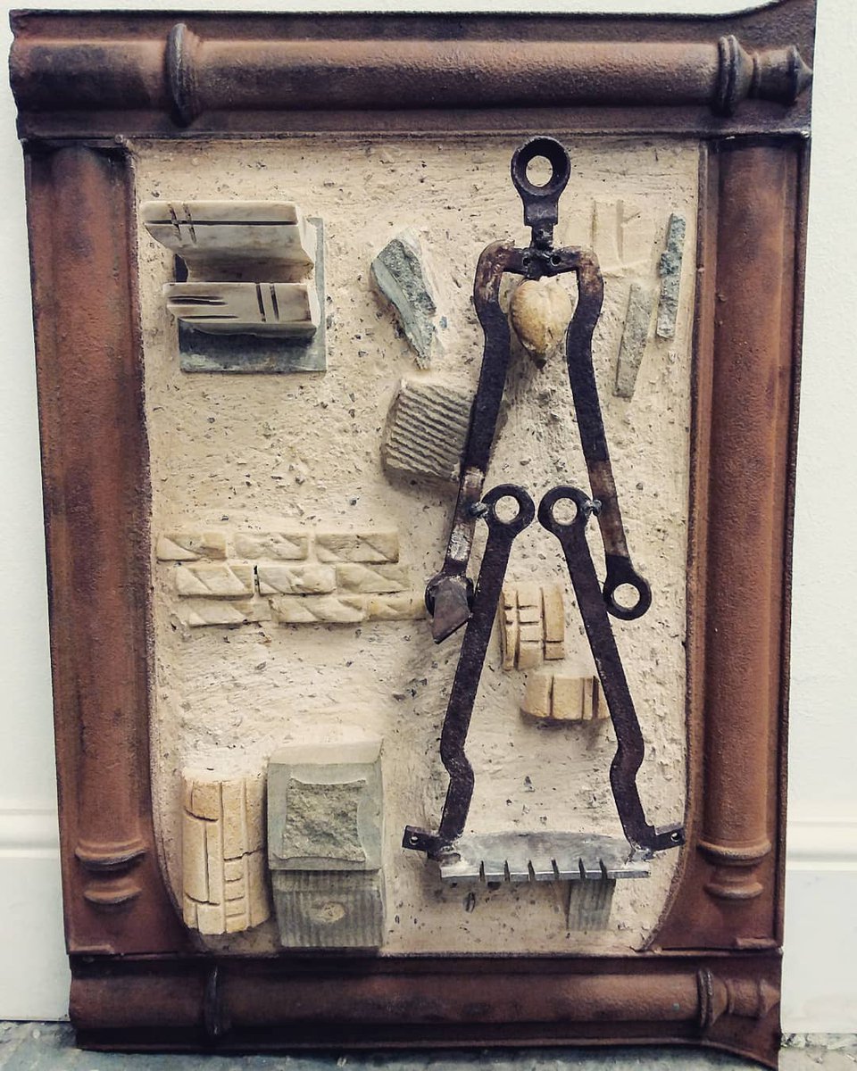 Written in stone 
Stone and Steel set in lime mortar inside a cast iron frame