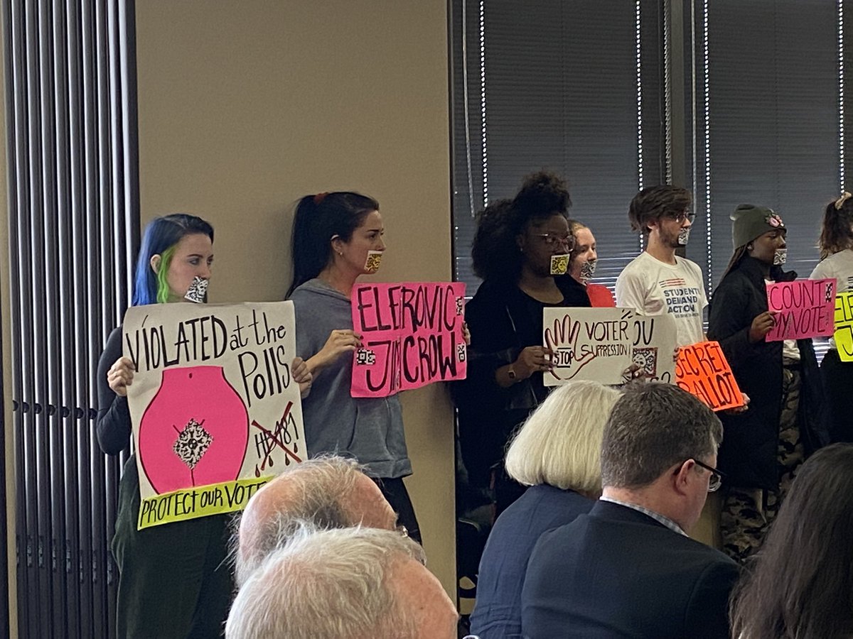 TheWayWithAnoa's tweet photo. Silent protest happening during the State Board of Election meeting. What is happening in GA could happen in your state. Are you paying attention? #gapol #VotingRights #VotingByMail #ElectronicJimCrow https://t.co/sdvmuKNVFX