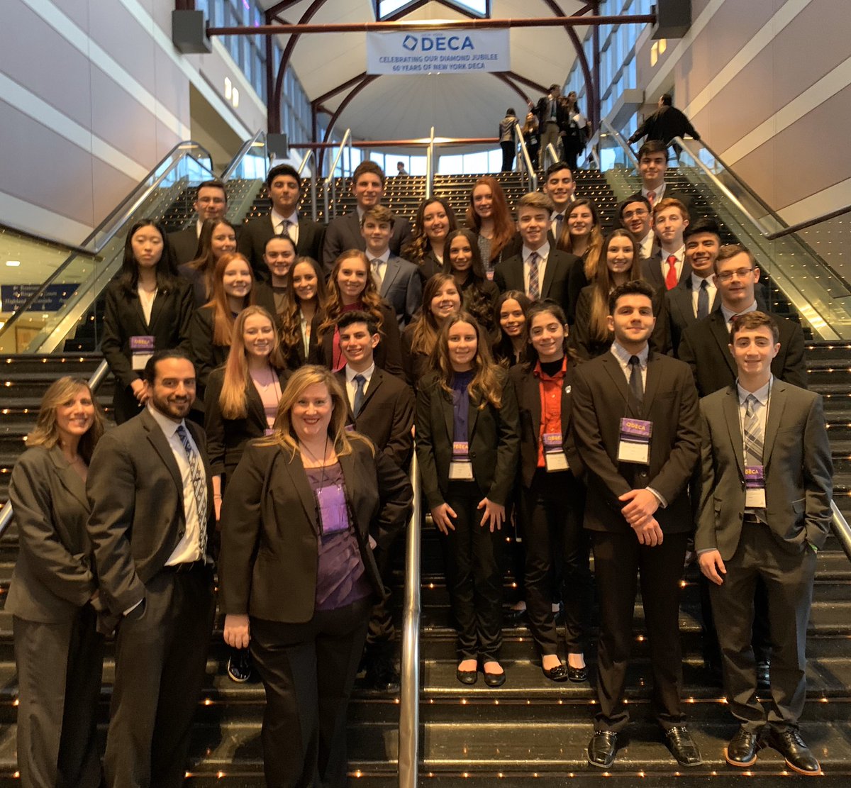 MrElsesser's tweet photo. And that’s a wrap from the #NYDECA State Conference and Competiton! Proud of how all of our #HSWBulls and @SCSD_HSE students represented themselves and our district! Congratulations to all those who competed and received honors! #SmithtownPride #ProudAP https://t.co/LGyB8i4eDF