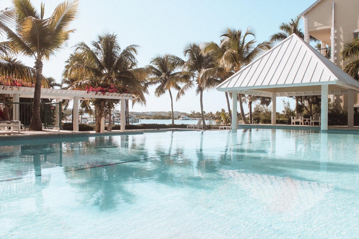 WebRezPro's tweet photo. The Yacht Club of #TurksandCaicos offers modern vacation rentals in a gated community. This property has chosen to use our #CloudPMS @WebRezPro! See WebRezPro's #BookingEngine in action on their website: https://t.co/ryA8HMXF6P #hotelsoftware #vacationrentals #resortsoftware https://t.co/t0GKeiO6Pj