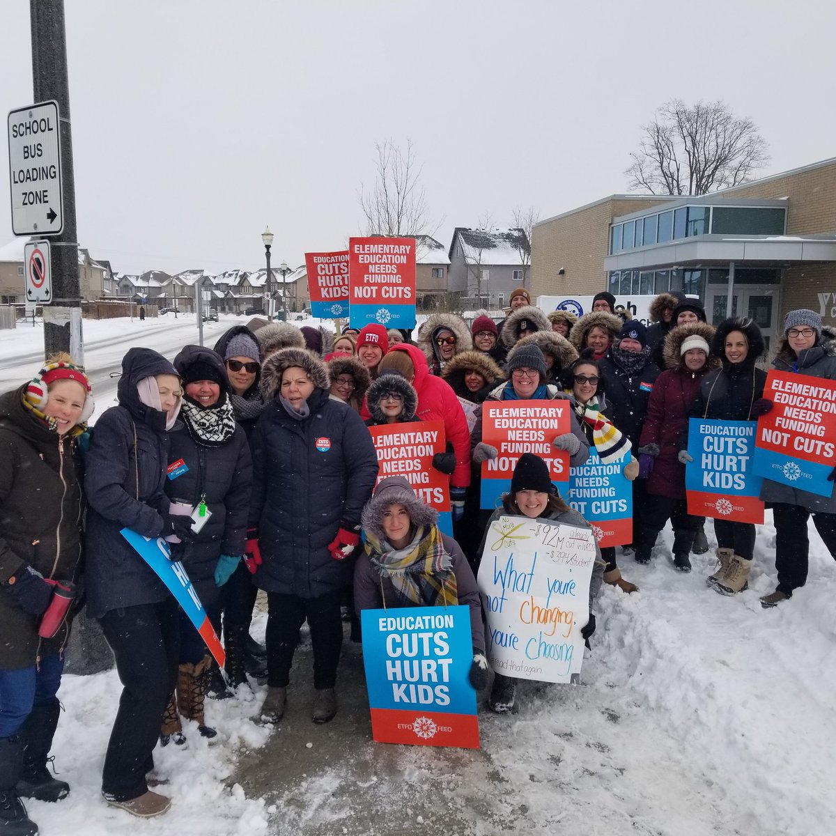 KellyKernest's tweet photo. Educators from @growrdsb walking to stop the cuts to education.  #RedforEd #CutsHurtKids #ETFOstrong #ETFO https://t.co/OkPydANiG1