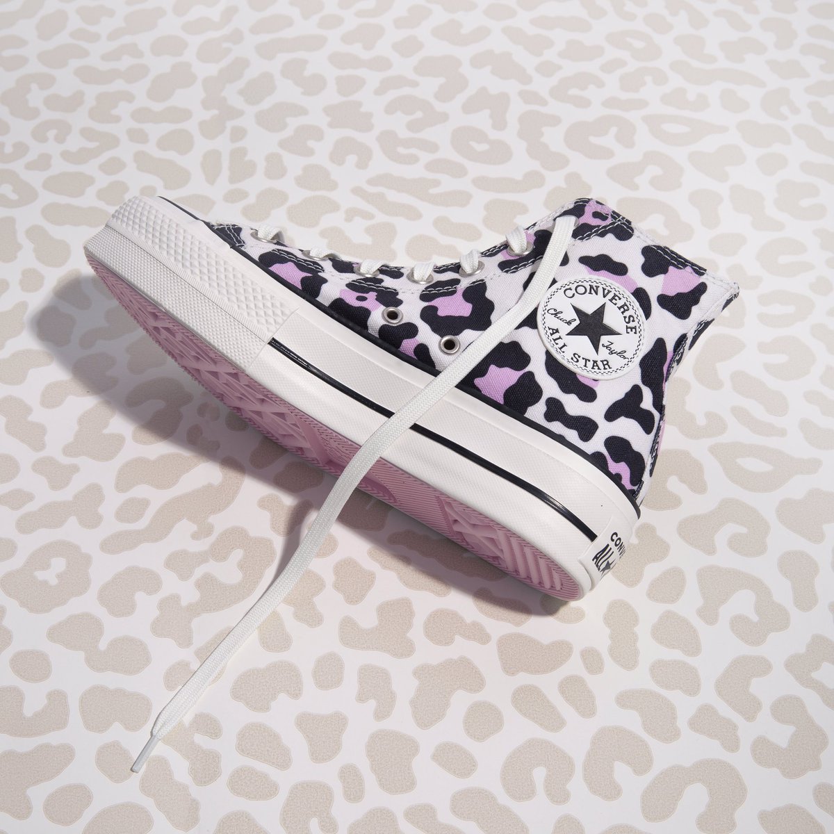 Converse in pink leopard print 