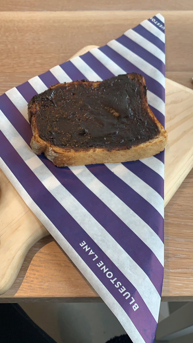 PoppyPascoe's tweet photo. @BluestoneLane you can’t call yourselves an “Aussie” coffee company and serve toast with this much vegemite. It’s #unauatralian. I had to scrape most of this off to eat it so it’s also #wasteful. Not cool. #Disappointed https://t.co/vPmKpH1V8z