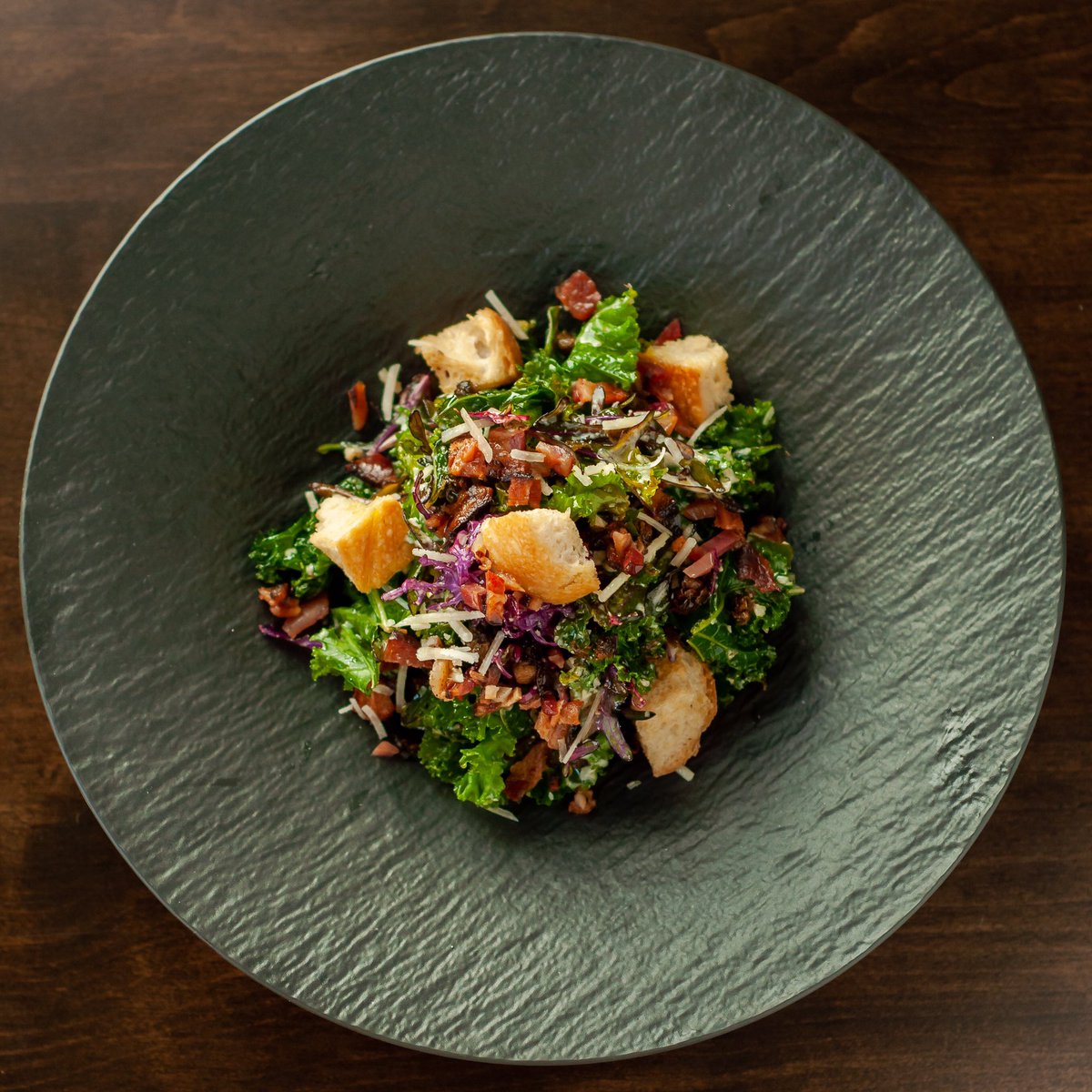 “Kale, Caesar!” Salad. Winter kale with double smoked bacon, parmesan, lemon garlic aioli dressing, fried capers, &amp; croutons. Clean your plate and then say veni vidi vici. 😉 #kalecaesar #kale #caesarsalad #dartmouth #dartmouthcrossing