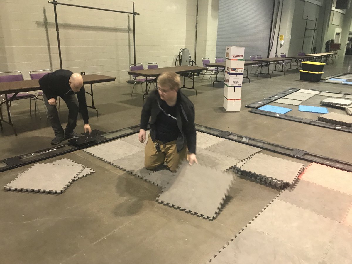 ScottRead85's tweet photo. Our very own Ryan Hurst helps with the set up for the NY Northern State VEX Championships to be held at the OnCenter in Syracuse,NY.  Many thanks to Bryan English for his leadership! #idesignsol https://t.co/yvi5GHbdKk
