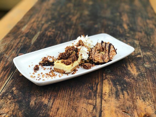 Save room for dessert! This <a href="/girlscouts/">Girl Scouts</a> inspired cheesecake has HOUSEMADE Samoa’s, chocolate, caramel, and oat crumble 🥥🍫