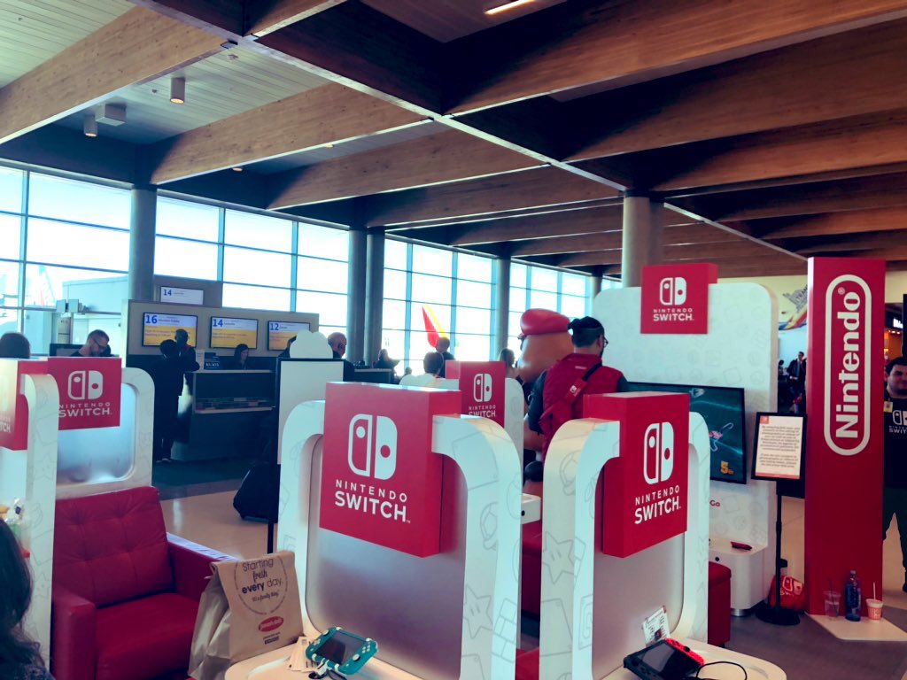 _Smirky's tweet photo. My trip to #PAXEast has begun in the best way possible!
@NintendoAmerica set up a station at Dallas-Love Field! I played a game of Smash and met the goombas! #NintendoSwitchOnTheGo
Now I can’t WAIT to play Animal Crossing in Boston! About to board my flight...let’s have fun! 🤗 https://t.co/SeJ7uSnbYx
