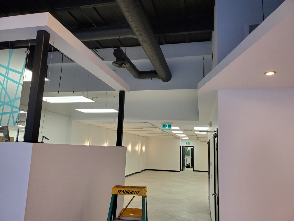 Finishing touches on the new walls and ceilings in a physiotherapy clinic in Edmonton.