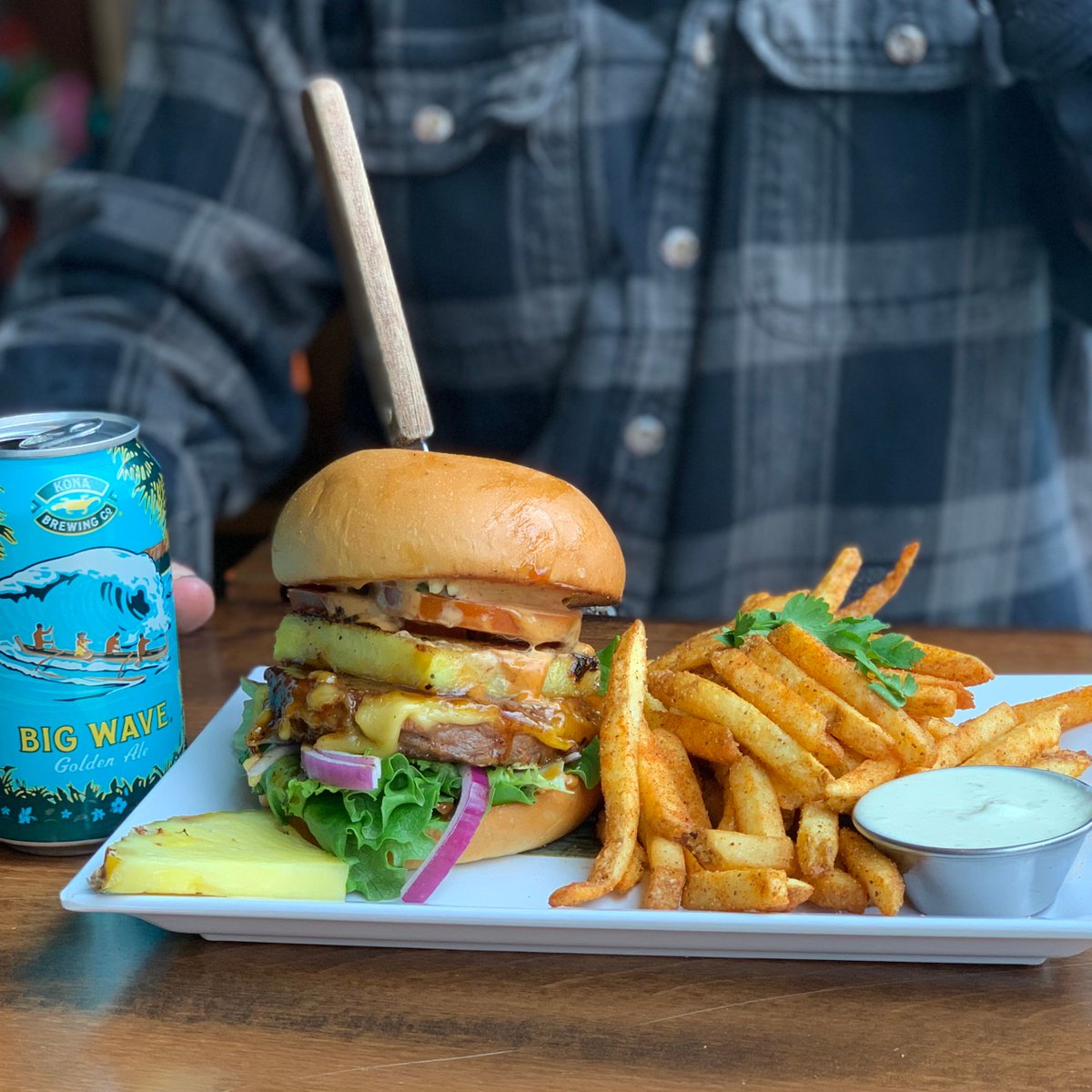 Pineapple Mavericks Burger 🍍 // grilled beyond burger patty with pineapple teriyaki sauce topped with cheese, grilled pineapple, smoked pepper aioli, roasted jalapeños, fresh tomato, lettuce and onion on a toasted bun served with old bay fries