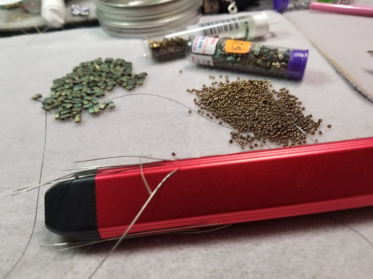When you're a beadwork artist and a vaper and you accidentally set a Caliburn (that has magnets) onto of a pile of bent needles you just sorted out to get rid of. I mindlessly picked up the Caliburn to vape and got poked! LOL!!!