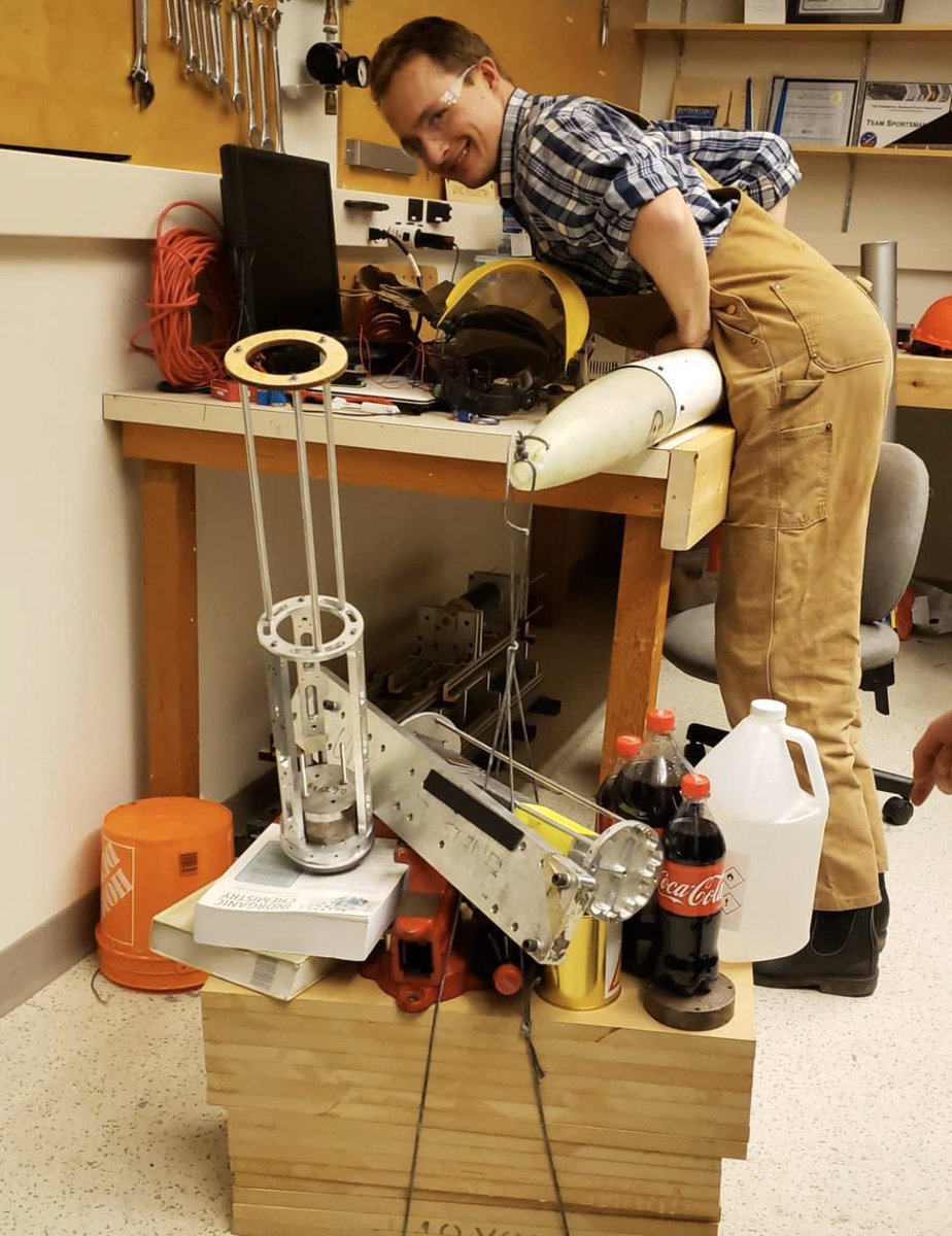 UVicRocketry's tweet photo. What else do you do when you run out of weights? You get creative (and yes, it’s off the ground). Bending a nose cone is fairly difficult as we’ve learned... 🚀 https://t.co/vbUeVB01sM