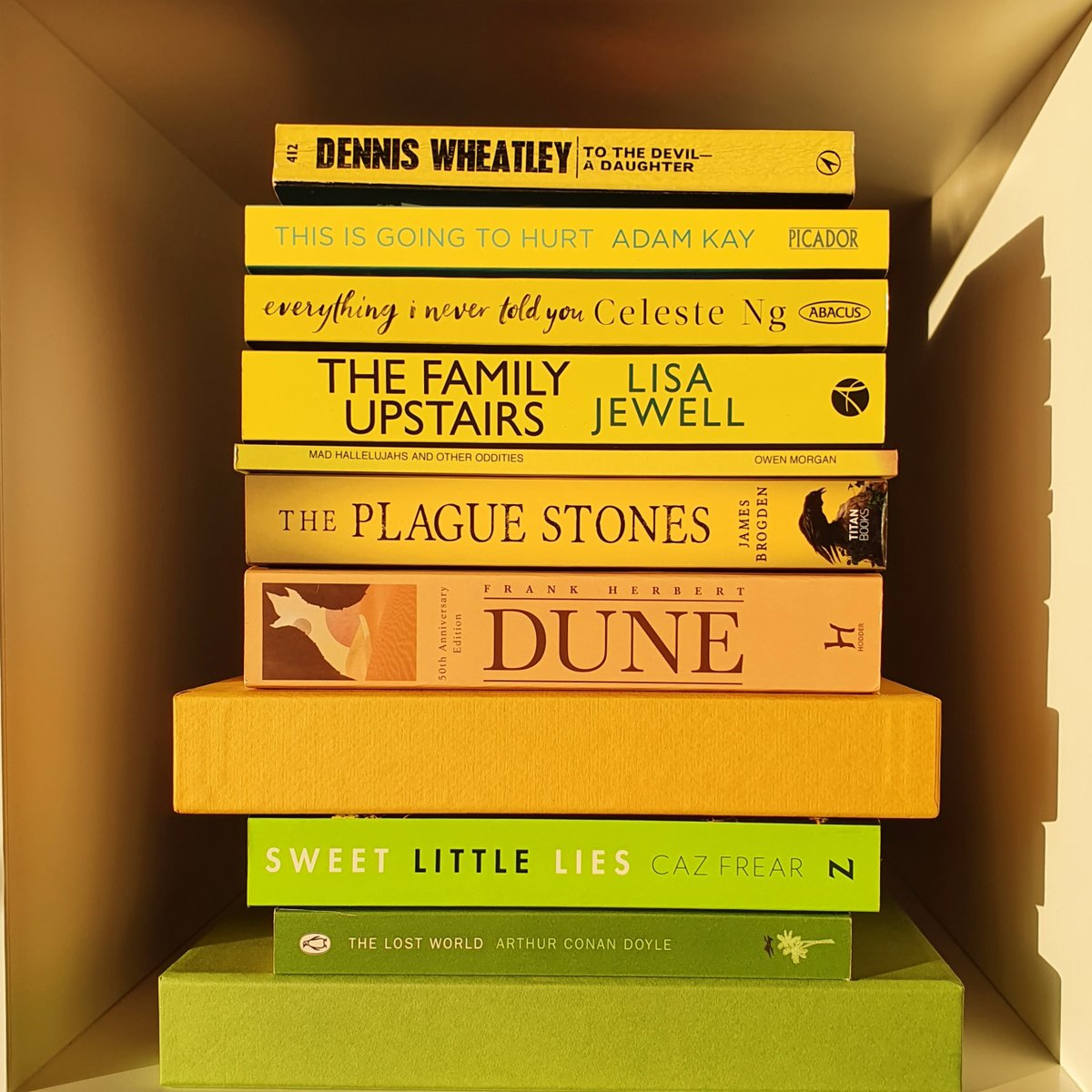 liveinabookshop's tweet photo. At the start of the month the lovely @book.and.a.brew tagged me to have a go at #dreamingofspringstack 

I didn't have many yellow books so I added green in 😀

As always in a #bookstackchallenge I have read only one in this pile 🙈

#foliosociety 
#springbookstack
#yellowbooks https://t.co/vtd2nmkIh0