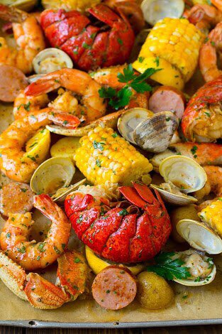 AmmarshaR's tweet photo. Cookin’ some Cajun style seafood with da boyz @etalks_podcast. We’re tryna replicate the left... and the right is our result. Not bad, I guess. https://t.co/OvYpQ4xdym