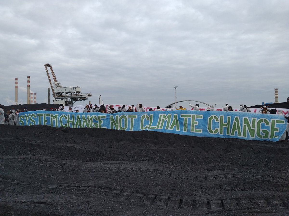 global_project's tweet image. After blocking the production, climate activists marched inside the plant. They demand the exit from coal and all fossil sources. The march has reached the coal tanks
 #climateaction
#stopcoal #endfossils #decoalonizetheplanet