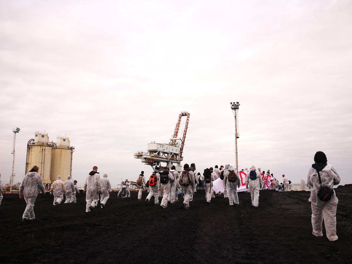 global_project's tweet image. After blocking the production, climate activists marched inside the plant. They demand the exit from coal and all fossil sources. The march has reached the coal tanks
 #climateaction
#stopcoal #endfossils #decoalonizetheplanet