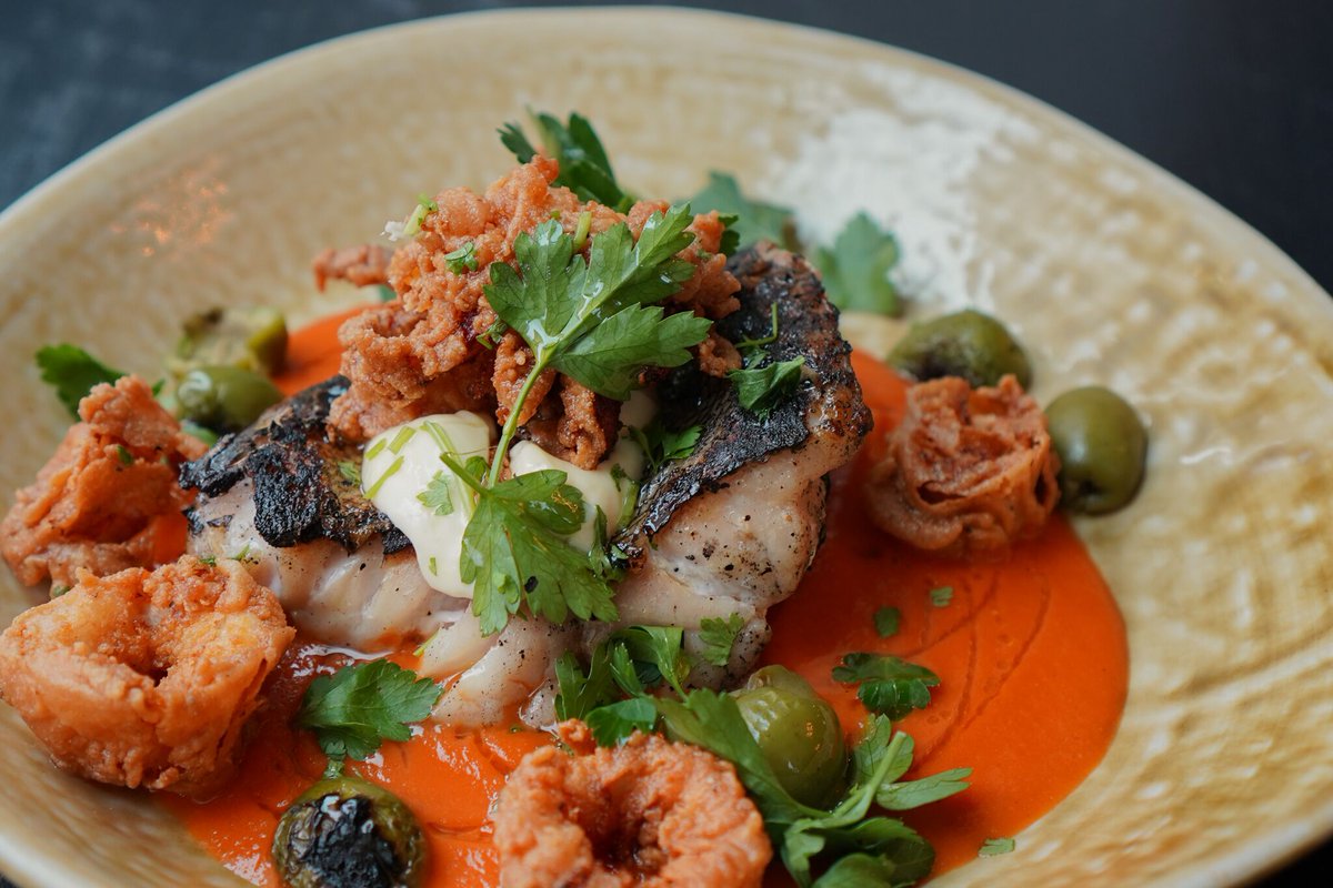 Our NC Fish got a brand new friend group with our new set: smoked tomato, crispy squid, Castelvetrano olives and buried garlic aioli.