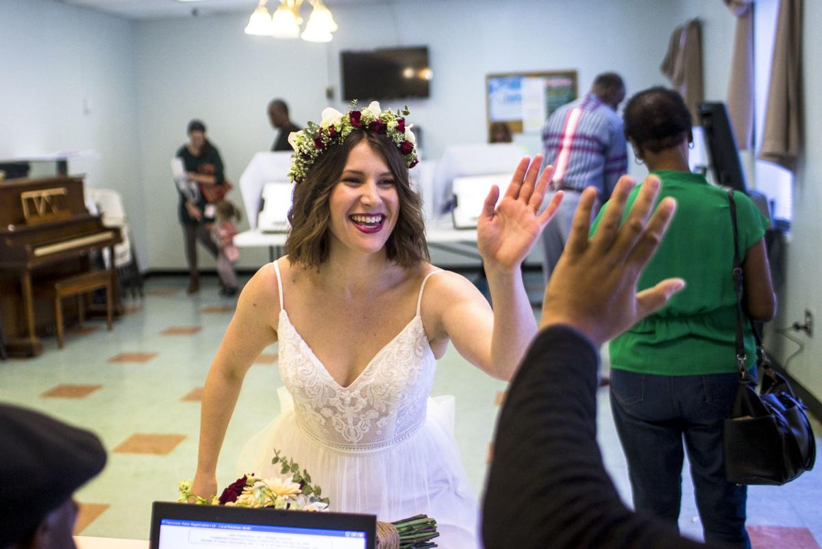 postandcourier's tweet photo. The Democratic presidential primary is in full swing here in South Carolina. 

One Charleston resident even showed up before her wedding to vote.

View more snapshots from the day so far: 

https://t.co/gzb1XZIS5w https://t.co/ZbOpT9dm2t