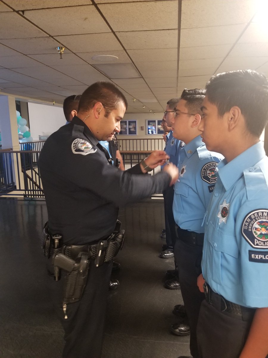 SBCUSDPOLICE's tweet photo. #POST304, led by Sergeant Raya and his Explorer Advisors begin the morning with a #UniformInspection and #RollCall prior to being deployed for the Auto Club 400 #NASCAR event at #FontanaSpeedway @SBSPDjpaulino @SB_CitySchools https://t.co/umHHHNIgoT