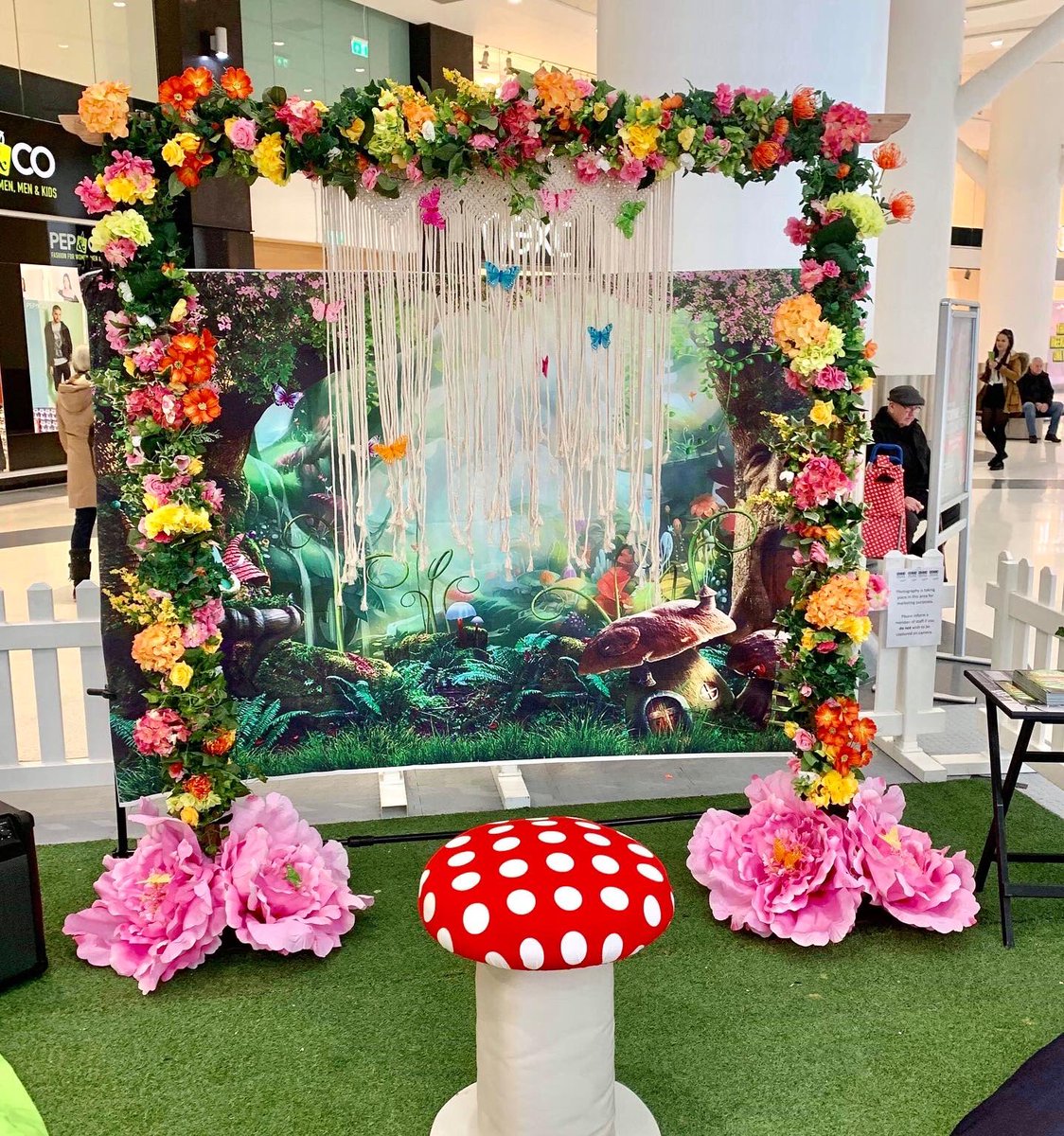 flowers_am's tweet photo. We thoroughly enjoyed creating the floral backdrop for todays Woodland Fairy Event at @GAWiganShopping Lots of beautiful colourful florals and matching butterflies was the orderof the day, we hope you liked it as mycg as we enjoyed making it #localbusinessesworkingtogether https://t.co/riDCpJMHcV