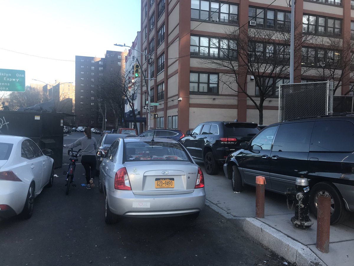 my friend <a href="/halesgee/">Haley G</a> had to get off and walk her bike in between illegally parked cars because the sidewalk is taken by illegally parked cars