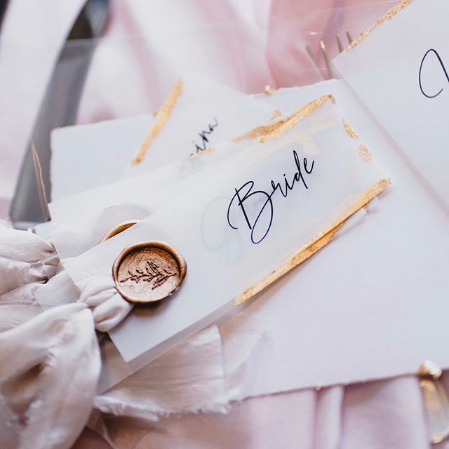 Place cards pretty enough to keep forever 💕
Vellum with gold leaf, silk and wax seals.
.
Photo by @lahuweddingphotography . .
.
.
.
.
#placename #escortcard #weddingideas #weddinginspiration #modernbride #bridetobe #bridetobe2020 #silktag #vellumplac… ift.tt/325By62