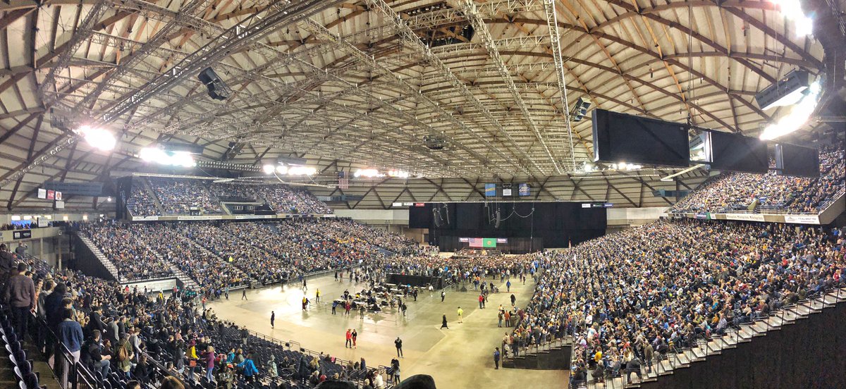 DogmomBoymom's tweet photo. So much positive energy tonight! 17k+ on attendance #BernieInTacoma #Bernie202 #FeelTheBern #NotMeUs https://t.co/BsMo1LMAAk