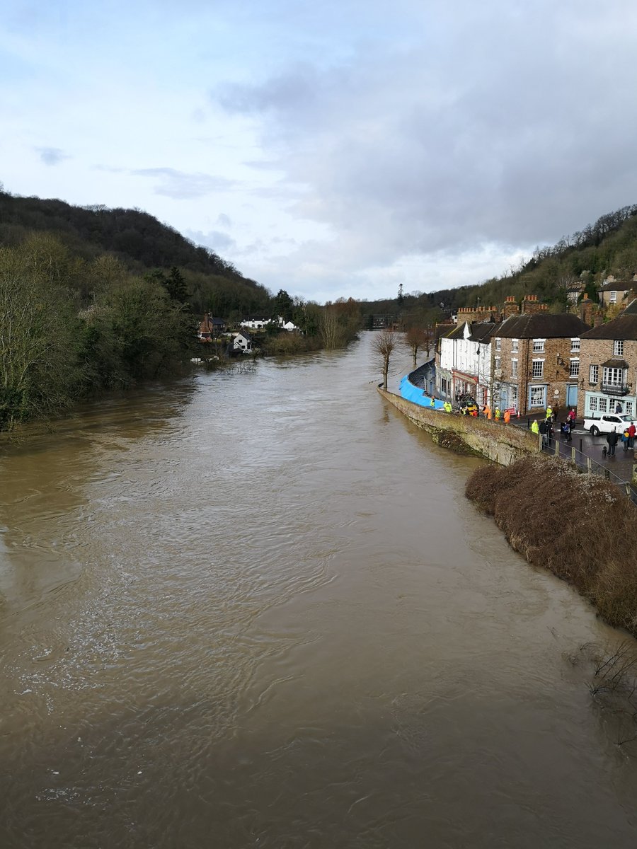 The little <a href="/CoracleTrust/">Ironbridge Coracle Trust</a> shed is somewhat surrounded by the after effects of storm Dennis. Thank goodness for the scaffold recently erected, otherwise it may have been swept away!