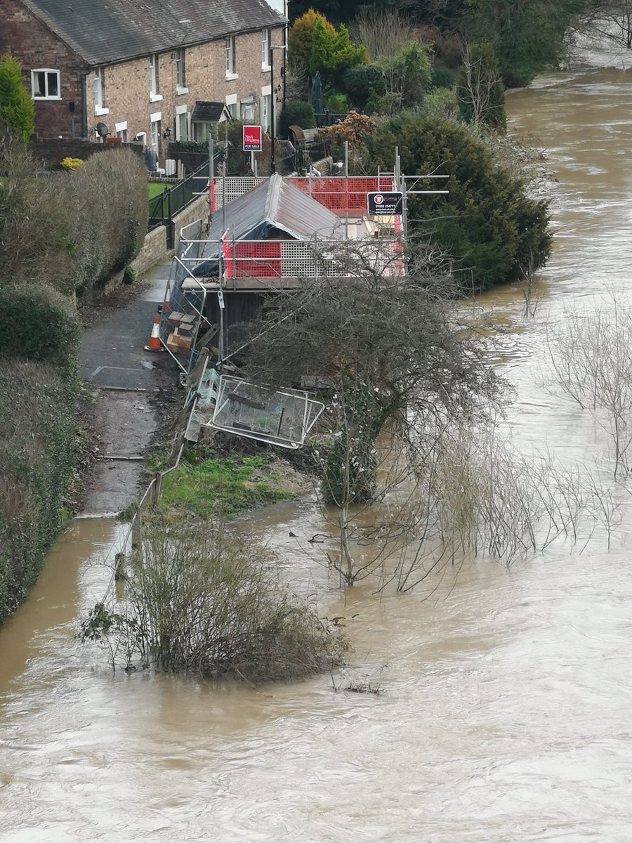messengerbcr's tweet photo. The little @CoracleTrust shed is somewhat surrounded by the after effects of storm Dennis. Thank goodness for the scaffold recently erected, otherwise it may have been swept away! https://t.co/OyETRFTFGH