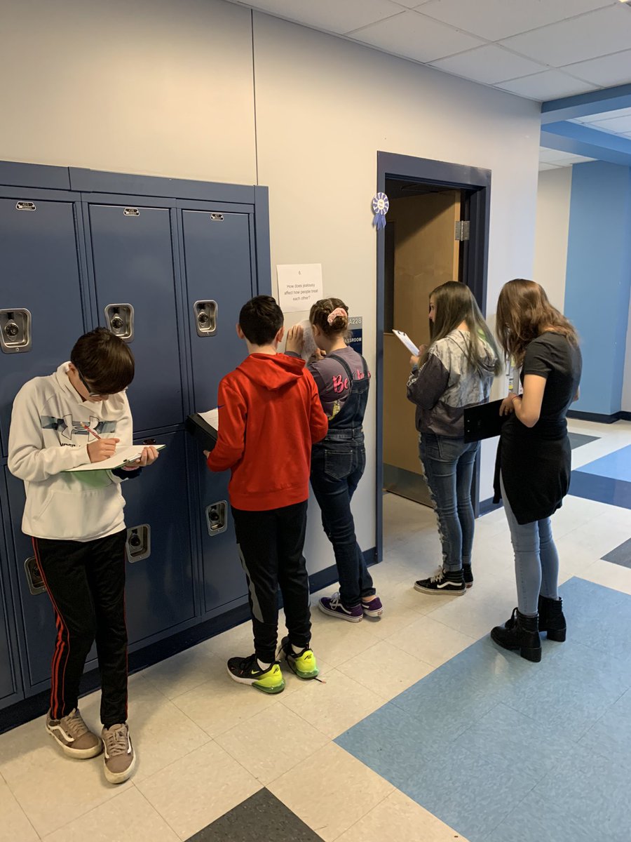 hartman231's tweet photo. A little Silent Gallery Walk before reading “All Summer in a Day”!  Get them up and moving after a long weekend!!!  We had some deep discussions!!  @GTMSTitans @IWCSchools  #deeperlearning #learningonthemove https://t.co/PKarzXj2Ew