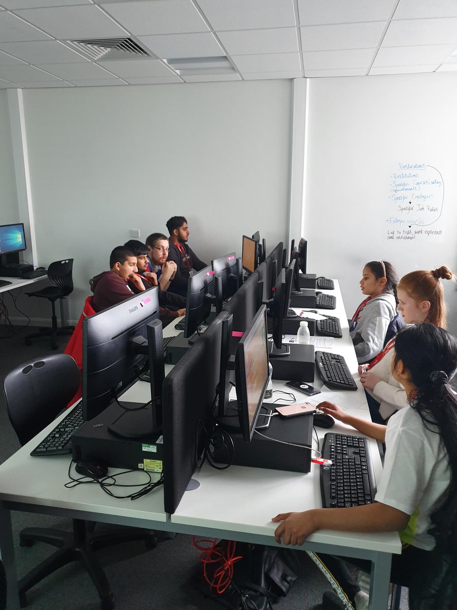 OnefileUK's tweet photo. Our developers, Mike &amp; Kenny are spending 2 days at @TamesideCollege for #Hack7 supporting 120 school children to develop their #coding skills! 🚀👩‍💻

Can you spot Mike mentoring in one of these pics? 👀
#readyhackers @TamesideHack https://t.co/jJfyk754OD