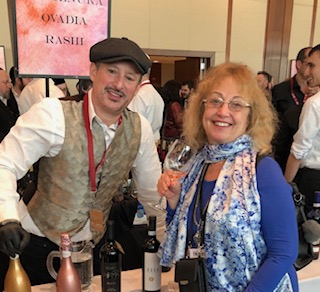 drsue6's tweet photo. Enjoying #KosherFoodandWineExperience2020 #kfwe Here’s To Life - L’Chaim - with sommelier (wine steward) Ouri Ivey and the #RoyalWineCorp. Thanks to #VickiGarfinkelJakubovic #VGJPR My blue-white scarf (like the #Israeli flag) is a gift from #HuayuanArt (#Chinese #Art company.) https://t.co/afvRBVB3ZX