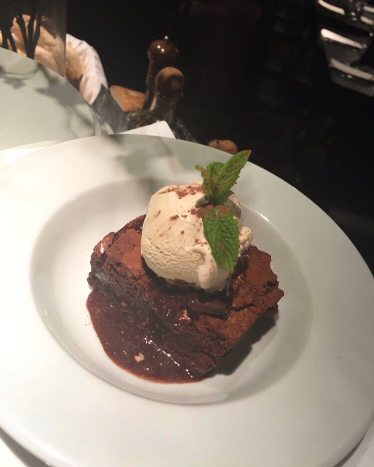 Mouthwatering warm fudgey chocolate brownie smothered in hot chocolate sauce and topped with creamy icecream 😍