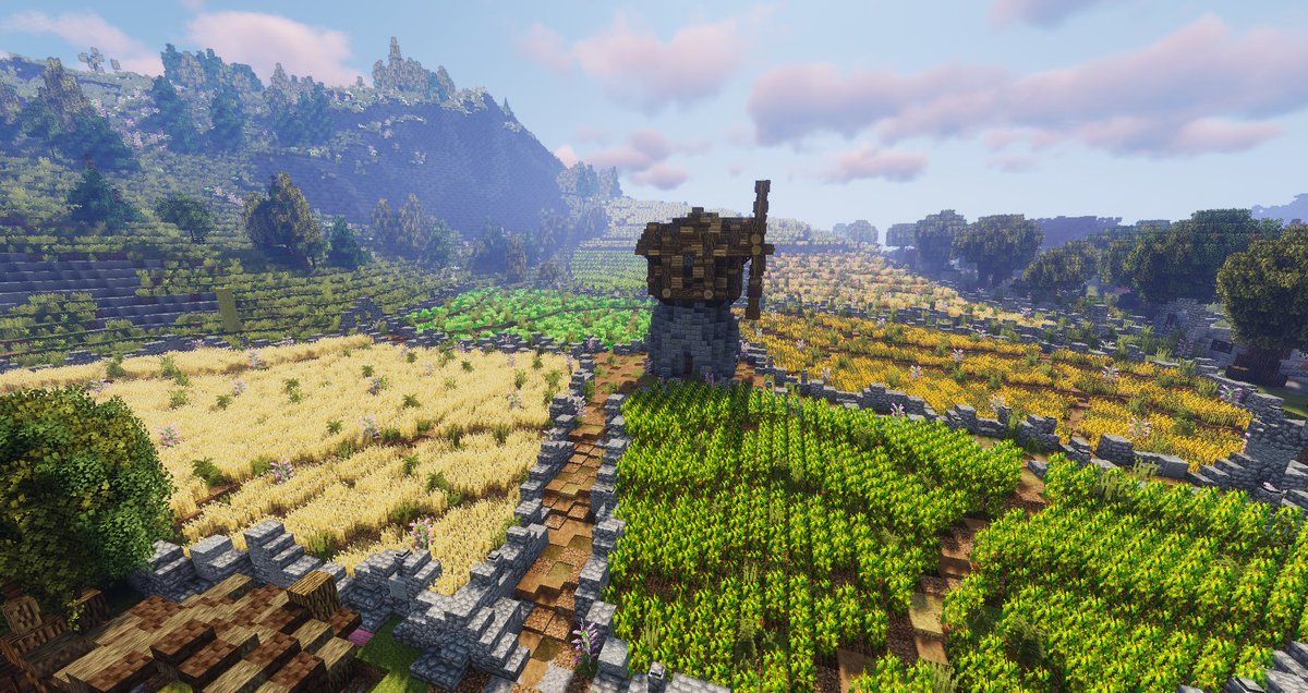 xAmiii2's tweet photo. I personally really love this view. The hillside on the left, the big trees on the right and the new farms with the windmill in the middle which i've recently built.🤩
#DivergingRealms #Minecraft #medieval https://t.co/ino7nGEMyd