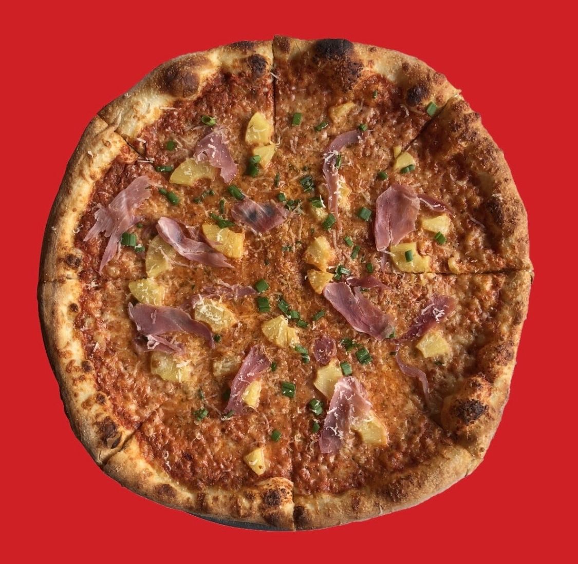 Where we land in the pineapple on pizza debate.  Our take on the classic Hawaiian pie, the Alana Johnson: cotto ham, pineapple, mozzarella, scallion and aged sharp provolone.