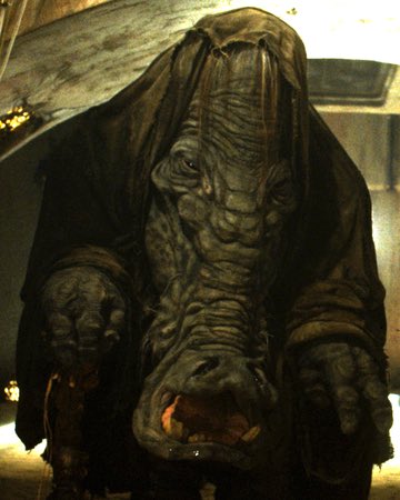 long face Guyso i have a feeling georges philosphy for the jabbas palace scene was "cantina scene with higher production value" cause you get a lot more wacky non humanoid aliens in this scene