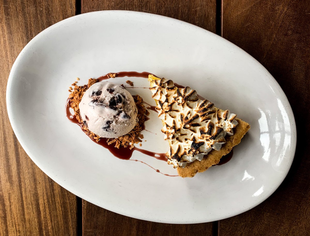NEW on our dessert menu: Lemon &amp; Toasted Meringue Tart with coconut crumble, lemon curd and served with house-made luxardo cherry gelato.