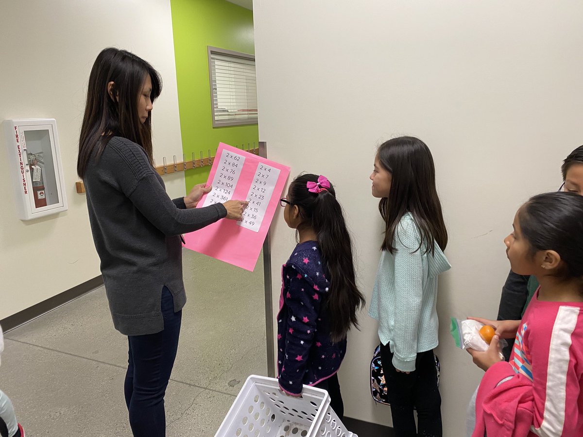 MrsJennCarr's tweet photo. 2nd graders working on their mental multiplication fluency on their way out to lunch @LMA_SMUSD #mathallday #LMAmath @mrs_kuoppamaki https://t.co/OymRJ6yhRK