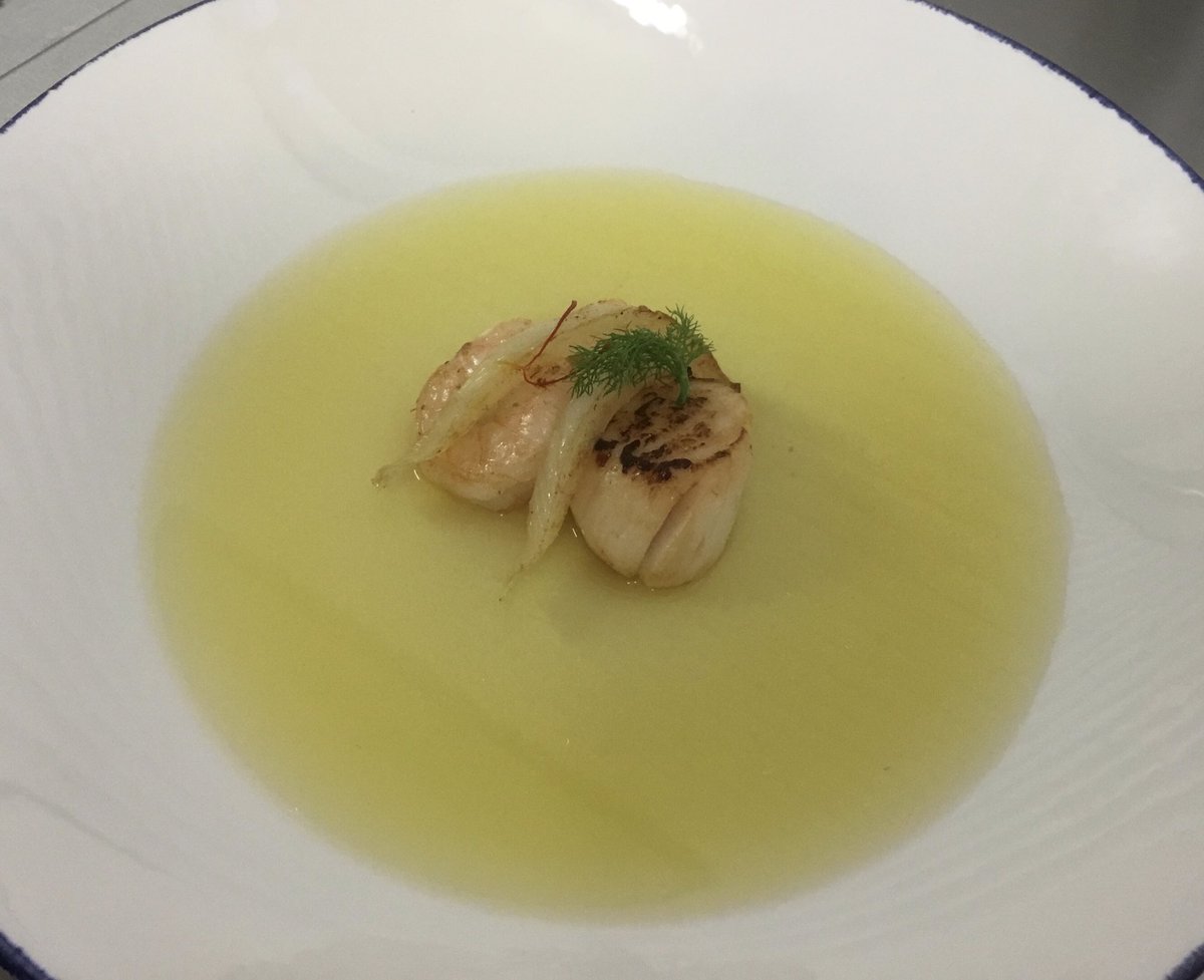 Sophie Henfrey from Leicester city fc producing her first Consommé, chicken and saffron with seared scallop, prawns and sous vide fennel. Clear and delicious .
