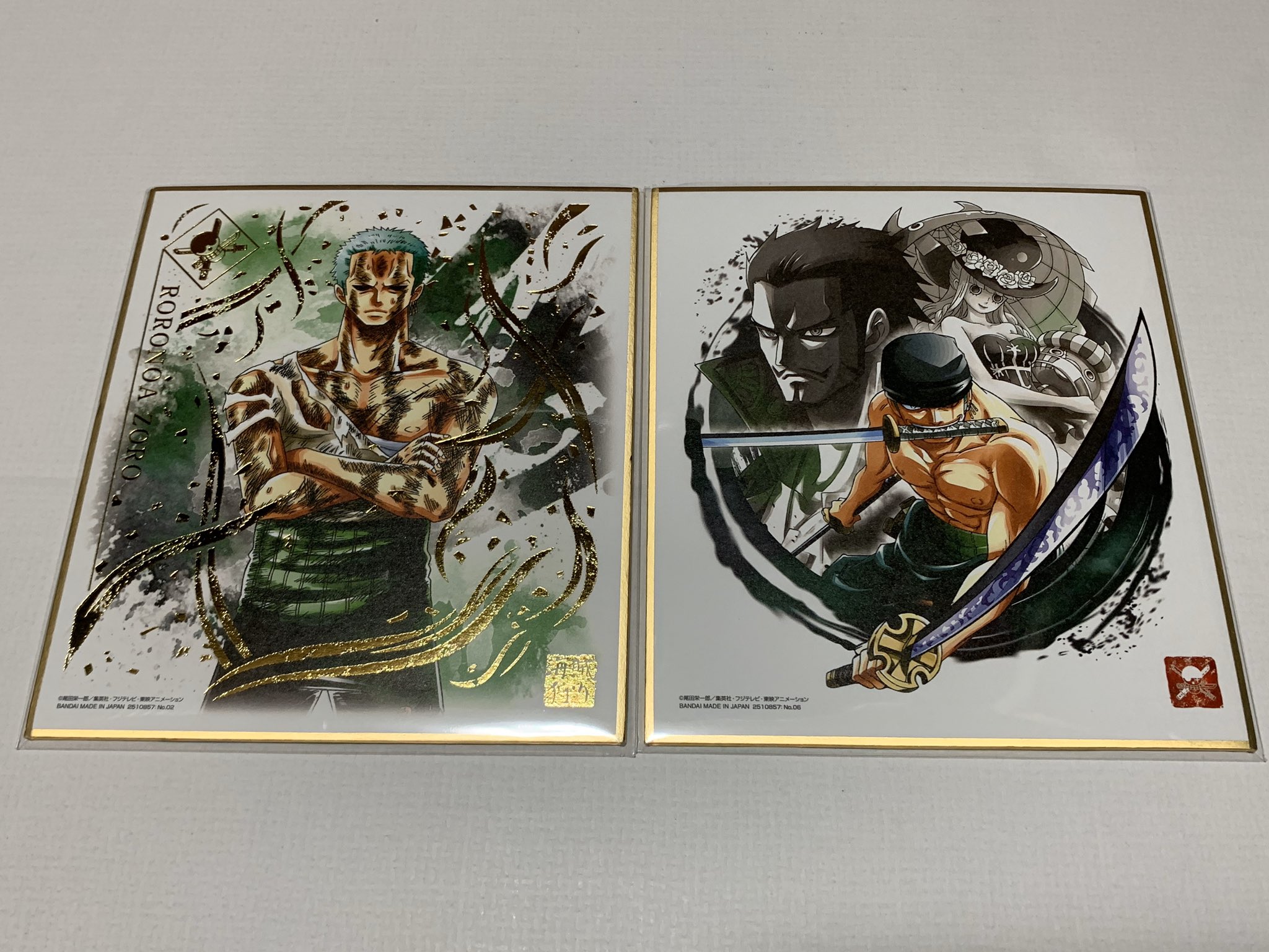 Kei One Piece垢 ゾロ のミニ色紙 この箔押し仕様のミニ色紙がめちゃくちゃカッコ良すぎる しかも 名場面が なにも な かった このシーンは一番の衝撃と言ってもいいぐらいかっこいい もう一つは背景にミホークとペローナが