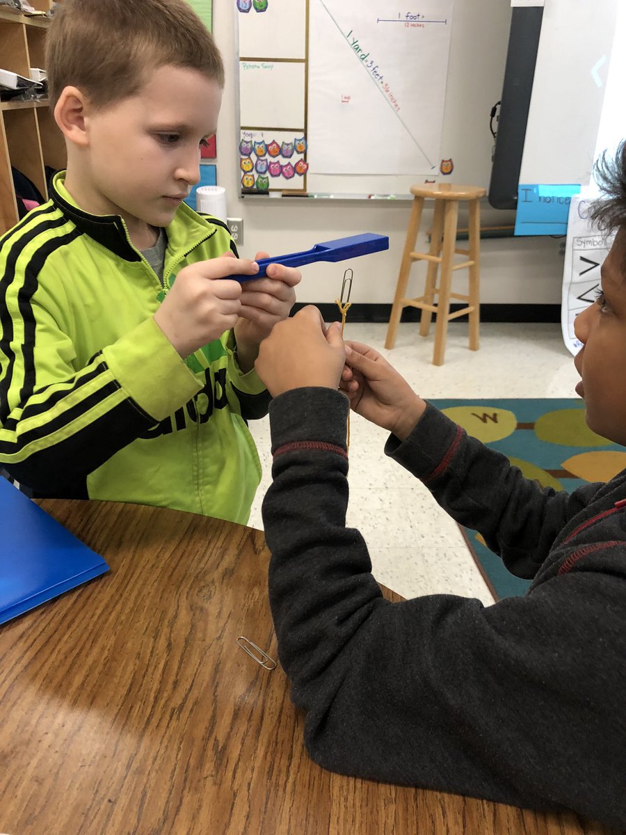 MissSchmalbeck's tweet photo. Minds hard at work discovering the properties of magnets! A little hands on explorative work to kick off our next science unit! Did you catch that floating paper clip? #engagedeagles @GroveElementary https://t.co/bMUeVaUyJt