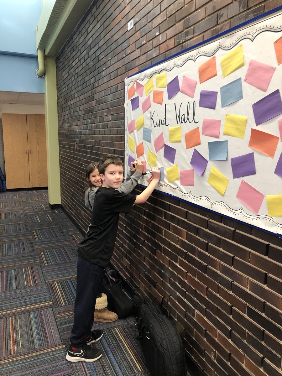 4th graders writing quotes on our kindness board! #engage109 #sp109