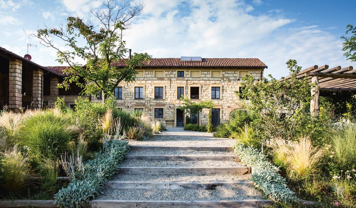 In an extract from 'Gardens of Eden' Abbye Churchill describes how in northern Italy, garden designer Cristina Mazzucchelli has created a bucolic resort landscape that is both ethereal and self-sustaining: buff.ly/37BIBEx